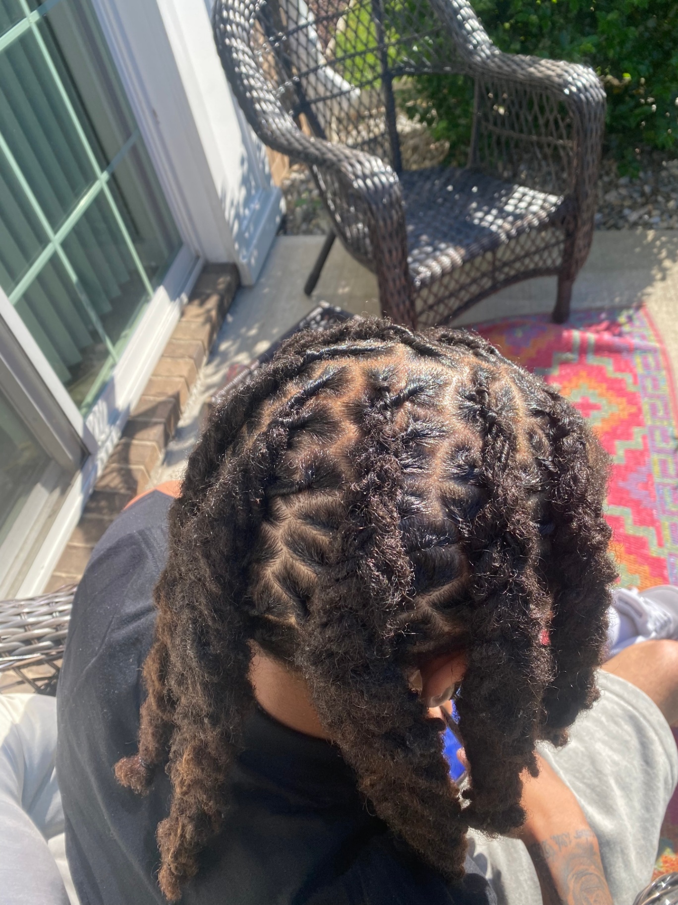 Sharp two-strand twists, outdoor portrait