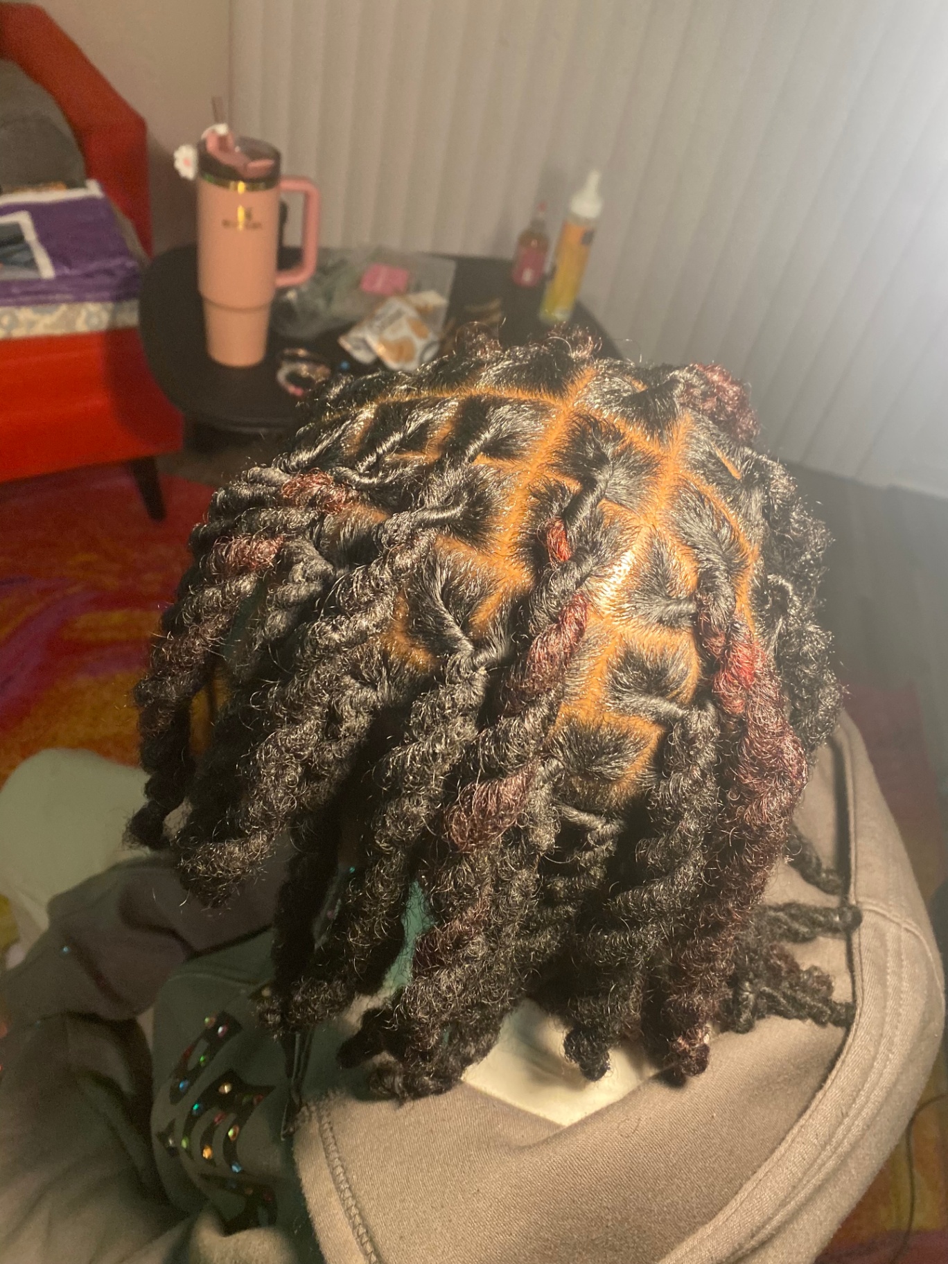 Fresh two-strand twist retwist with copper accents